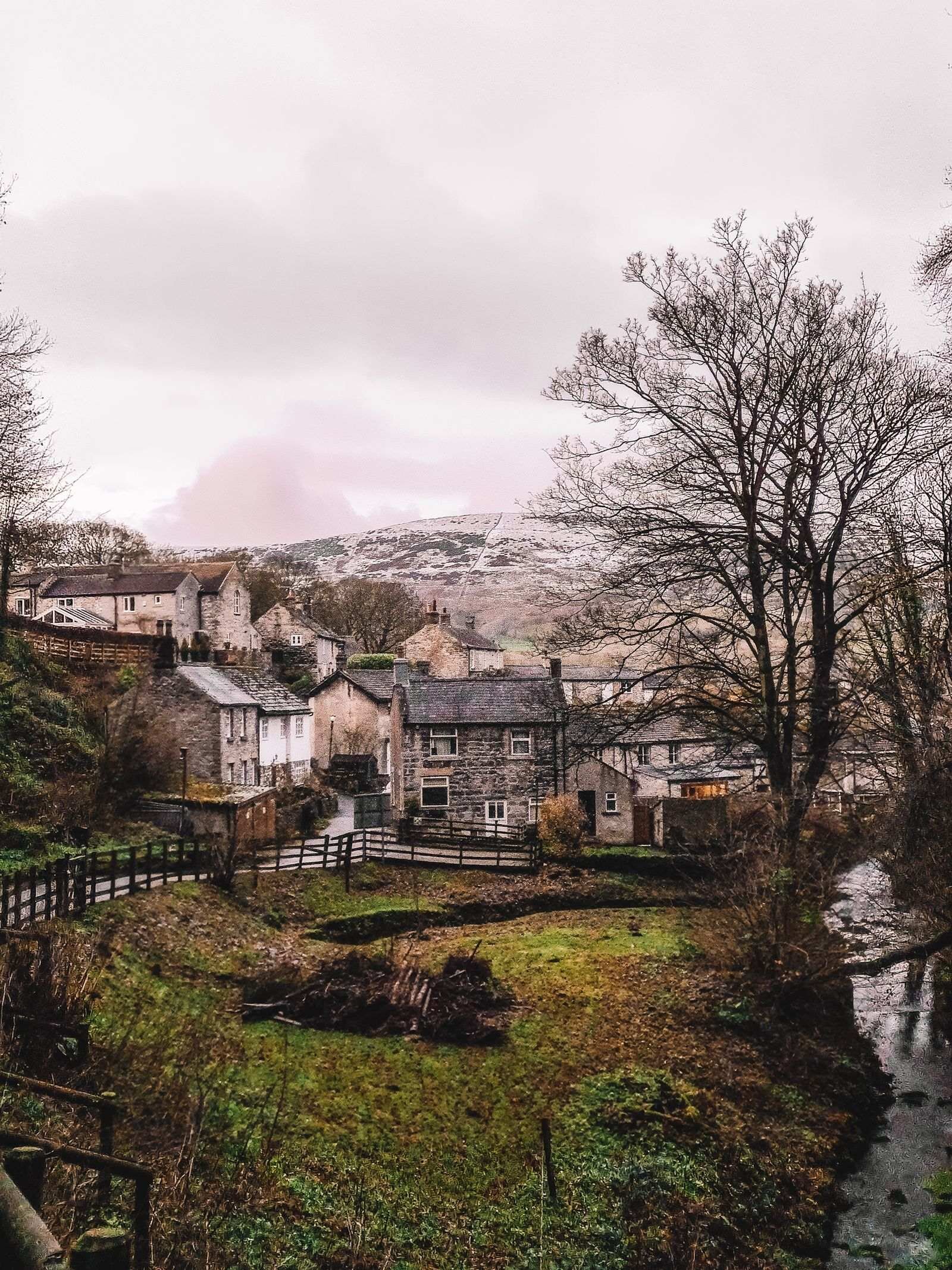 View of Castleton at the entrance of Peak Cavern