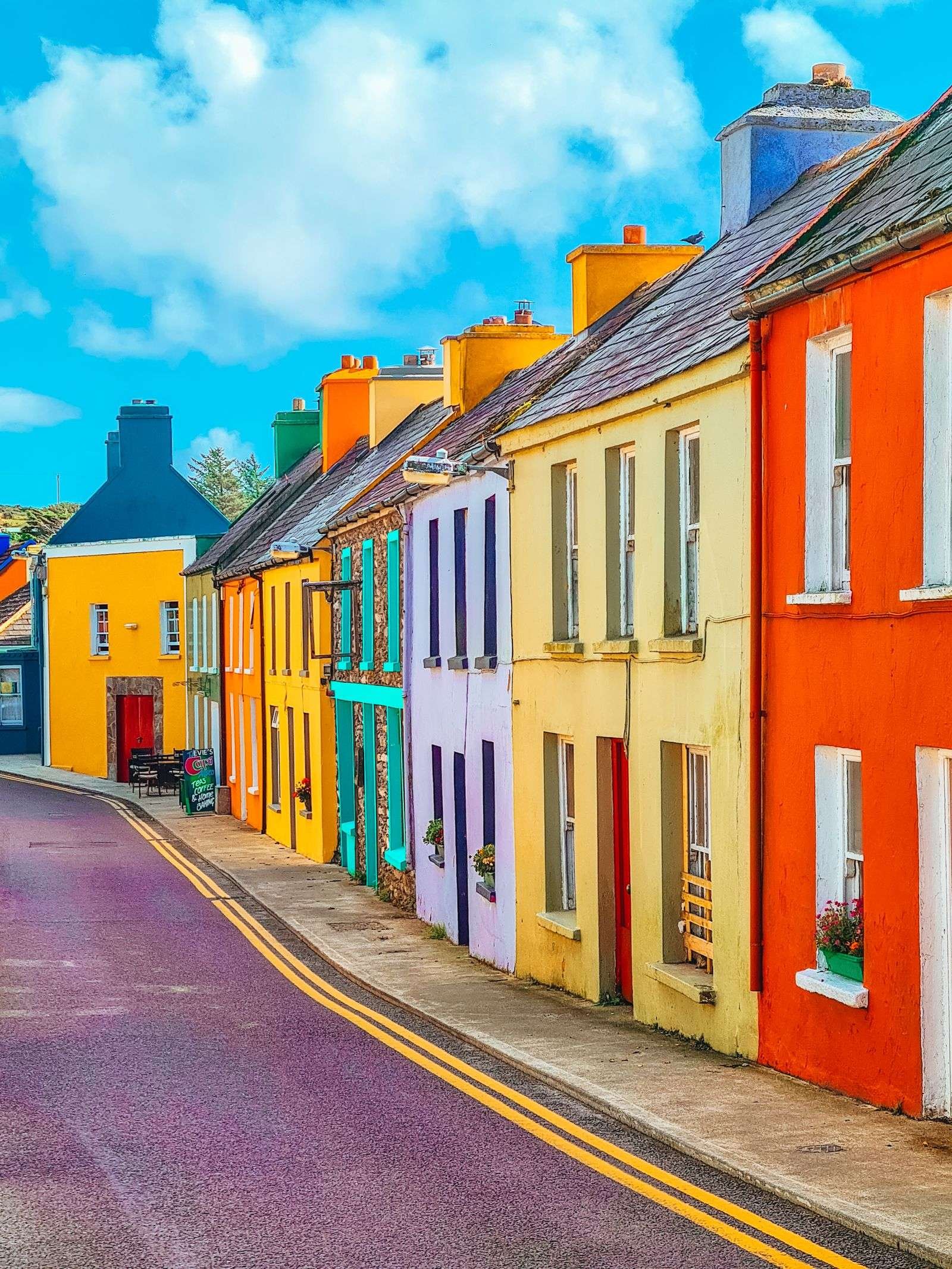  The colourful houses of Eyeries lining the street 