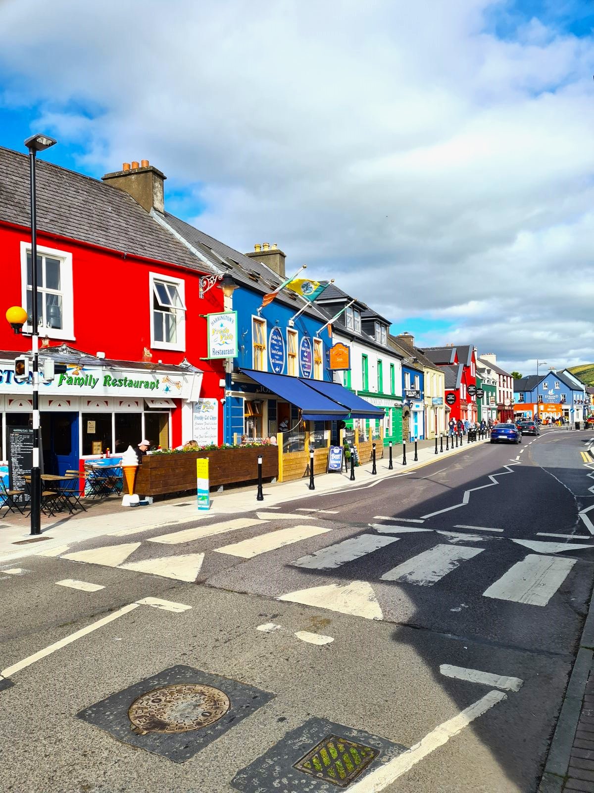  A cross walk in front of the colourful Dingle high street 