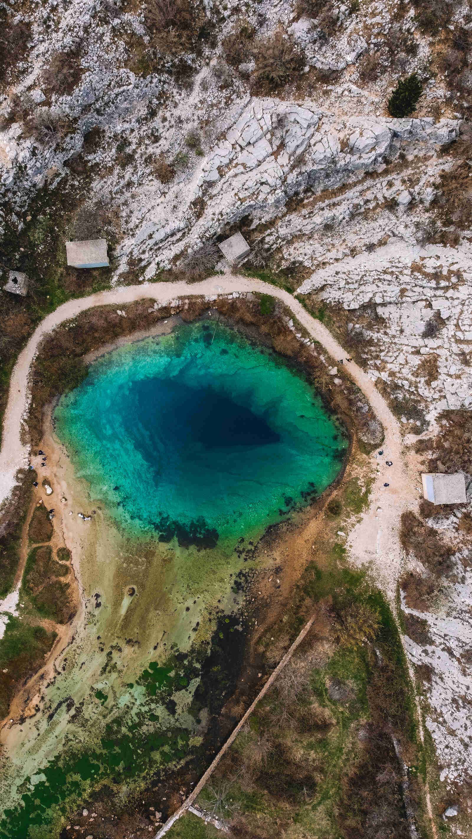turquoise blue spring from above