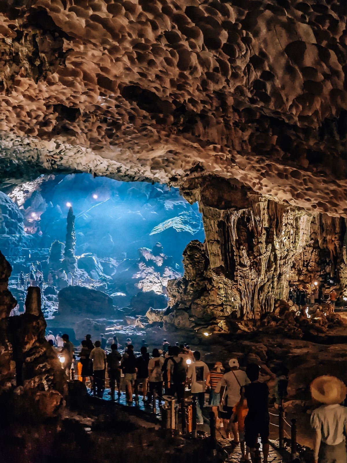 a large cave with stalactite rock formations in Ha Long Bay vietnam