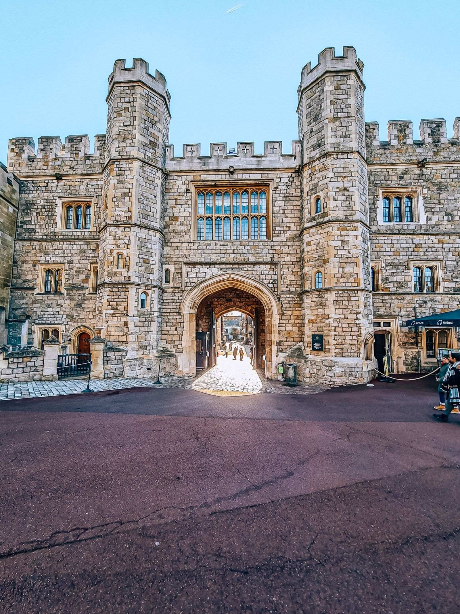 large stone towers and archway entrance to Windsor castle