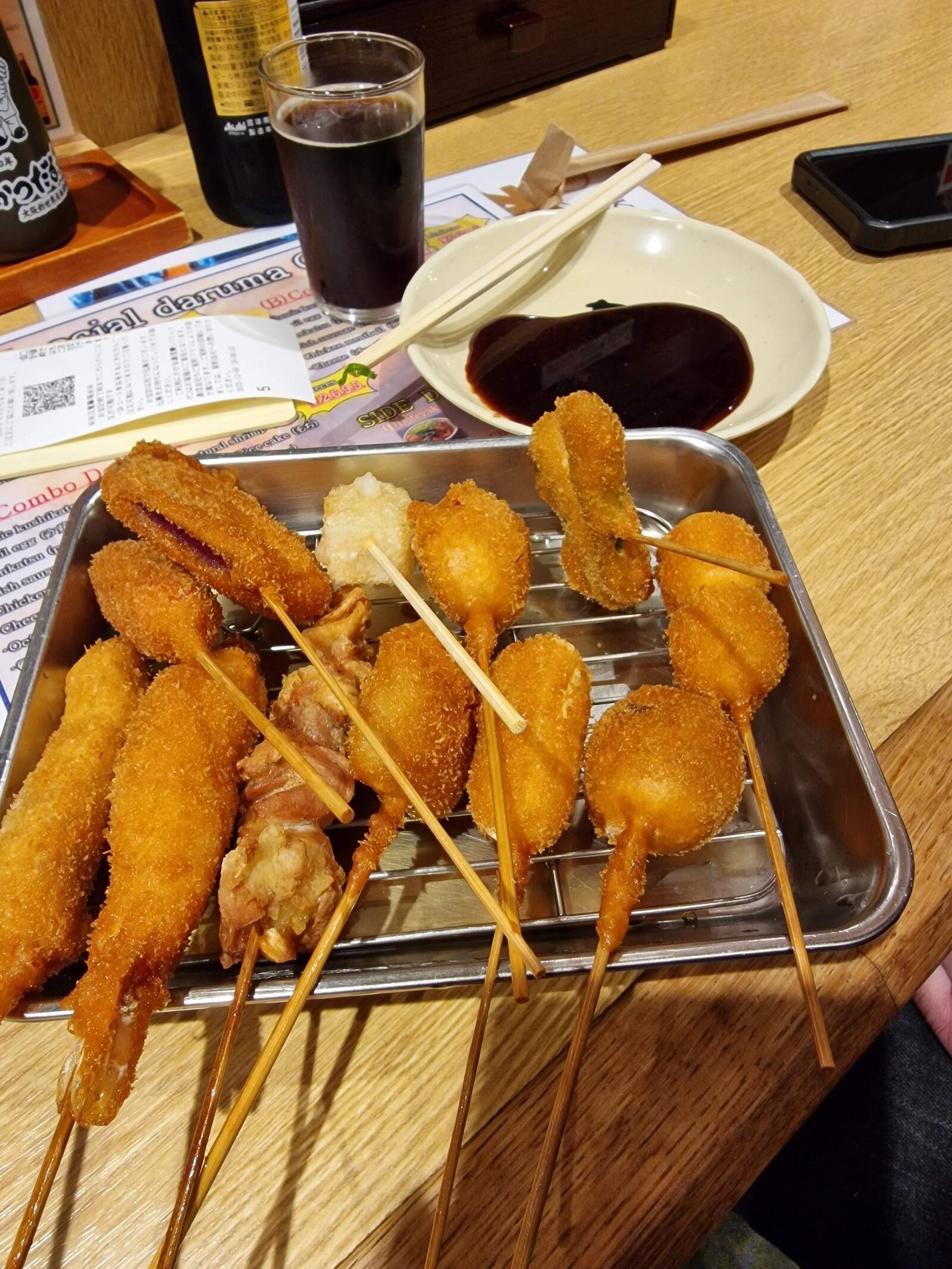 lots of fried food on sticks, various shapes - kushikatsu in osaka Japan
