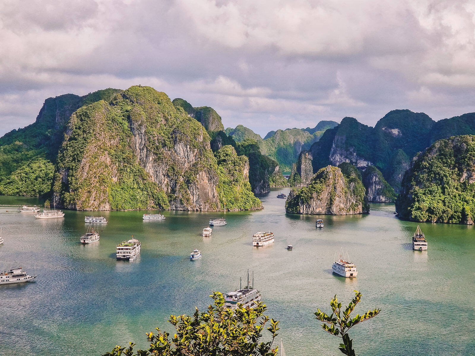 boats floating in halong bay seen from above