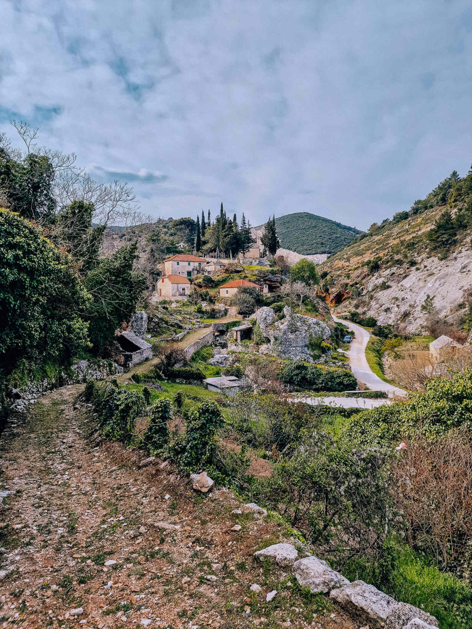 a small old stone village on a hill - Dol ethno village, Postira Brac Island