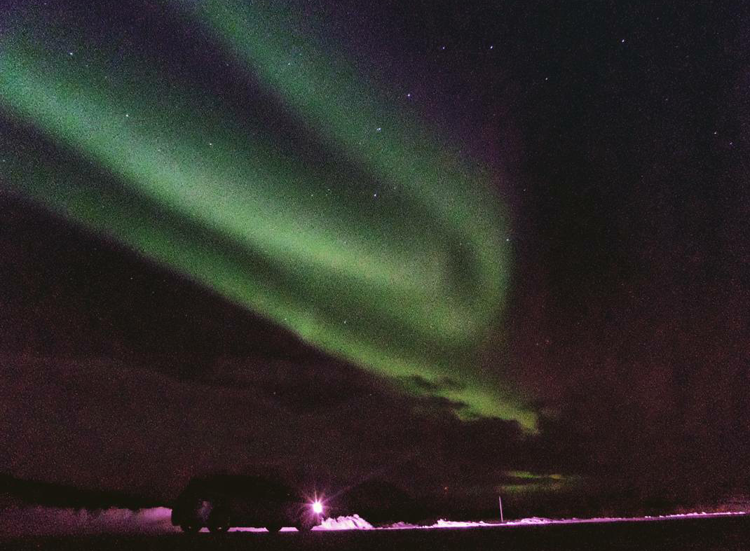 Green northern lights during the night