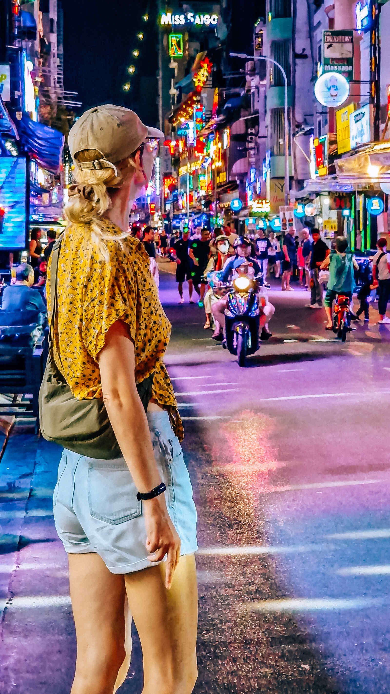 a busy nightlife street in Ho Chi Ming City, Vietnam