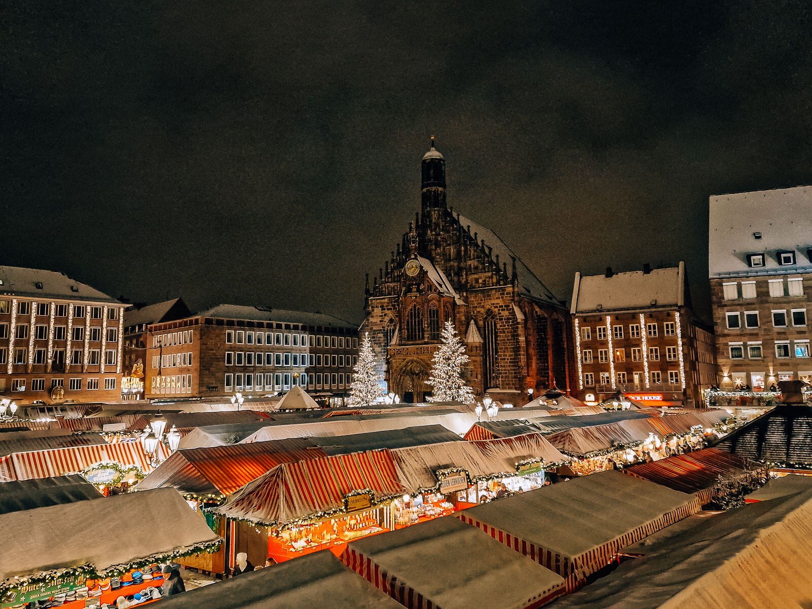 stripped tops of market stalls in nuremberg chriskindlesmarkt at night