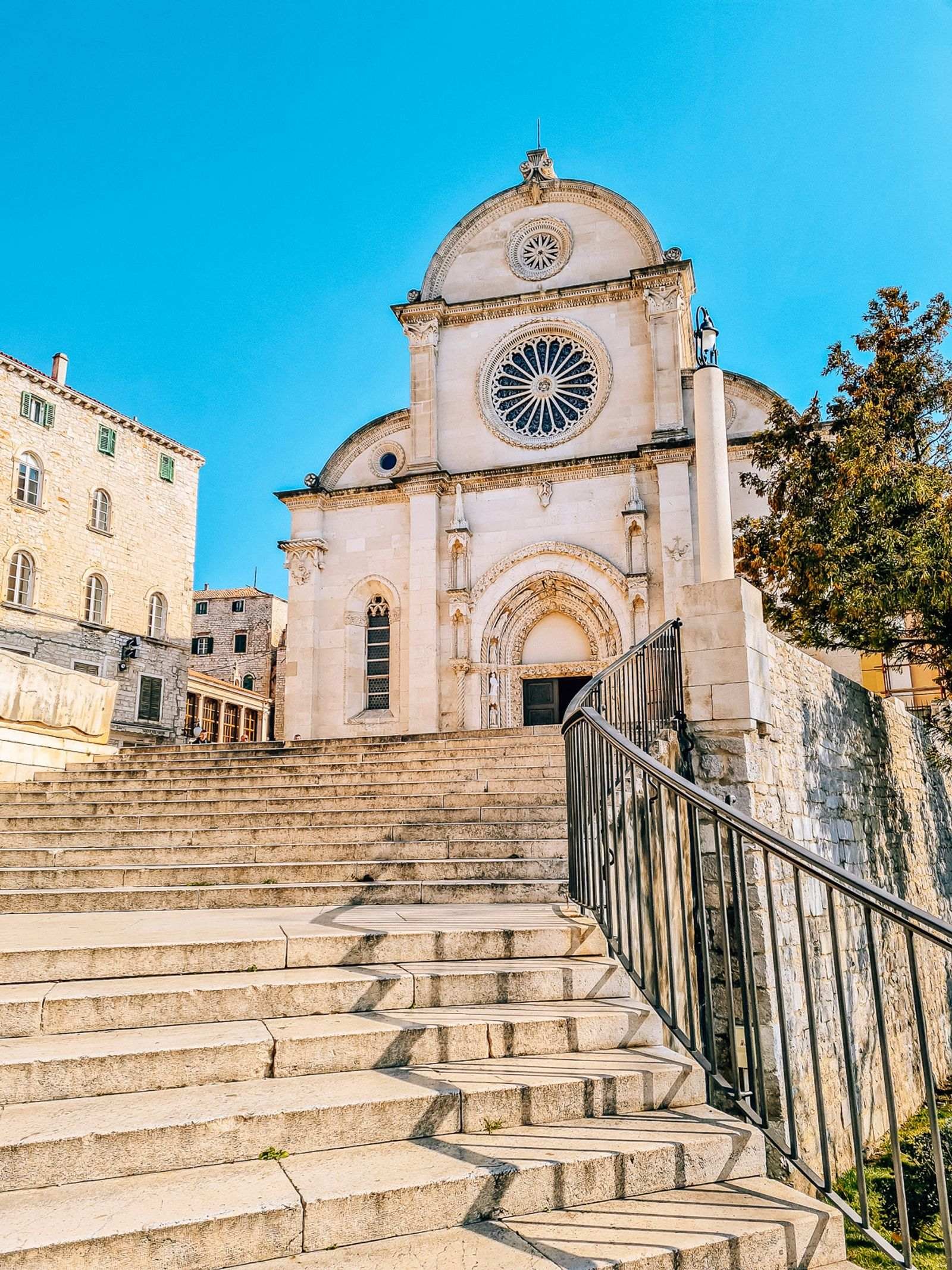 image of sweeping white stone steps with a cathedral at the top