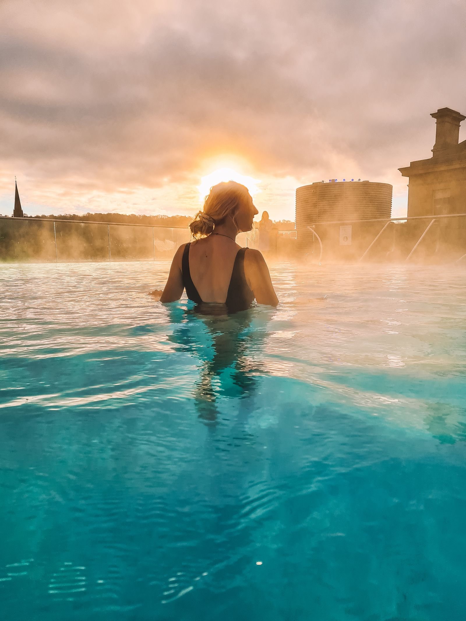 rooftop pool at Thermae Spa with steam rising