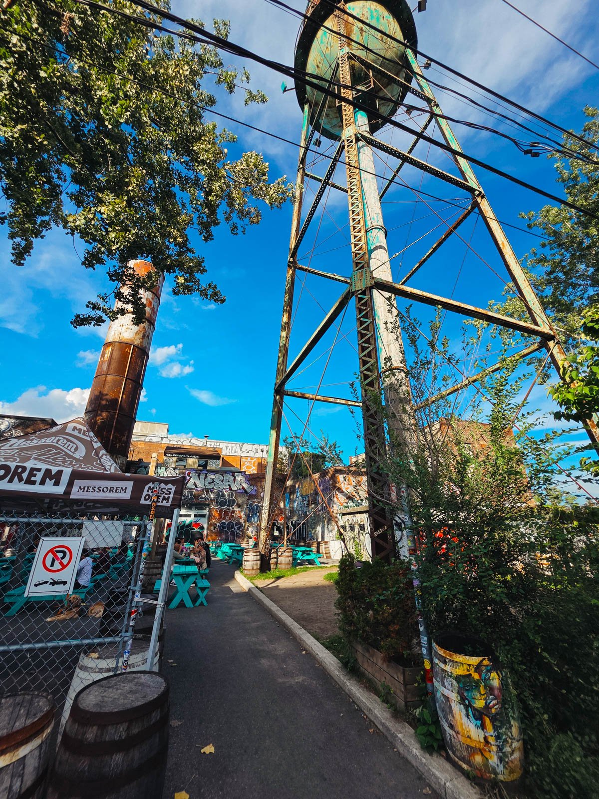 A disused water tower in an industrial style beer garden