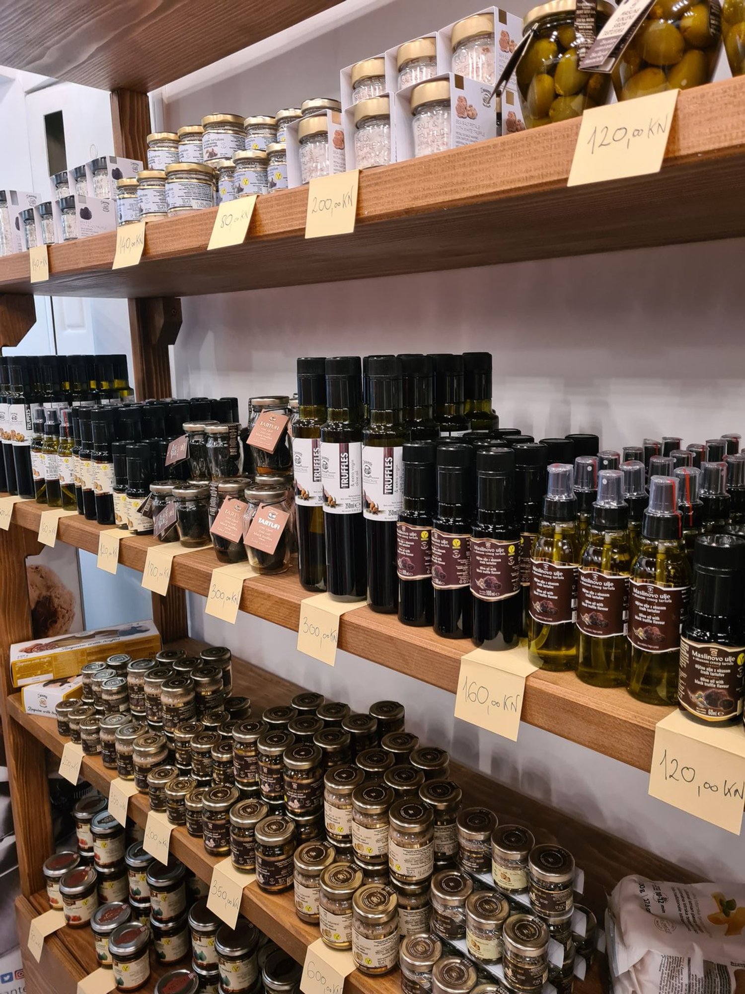 truffle products on a shelf in a shop