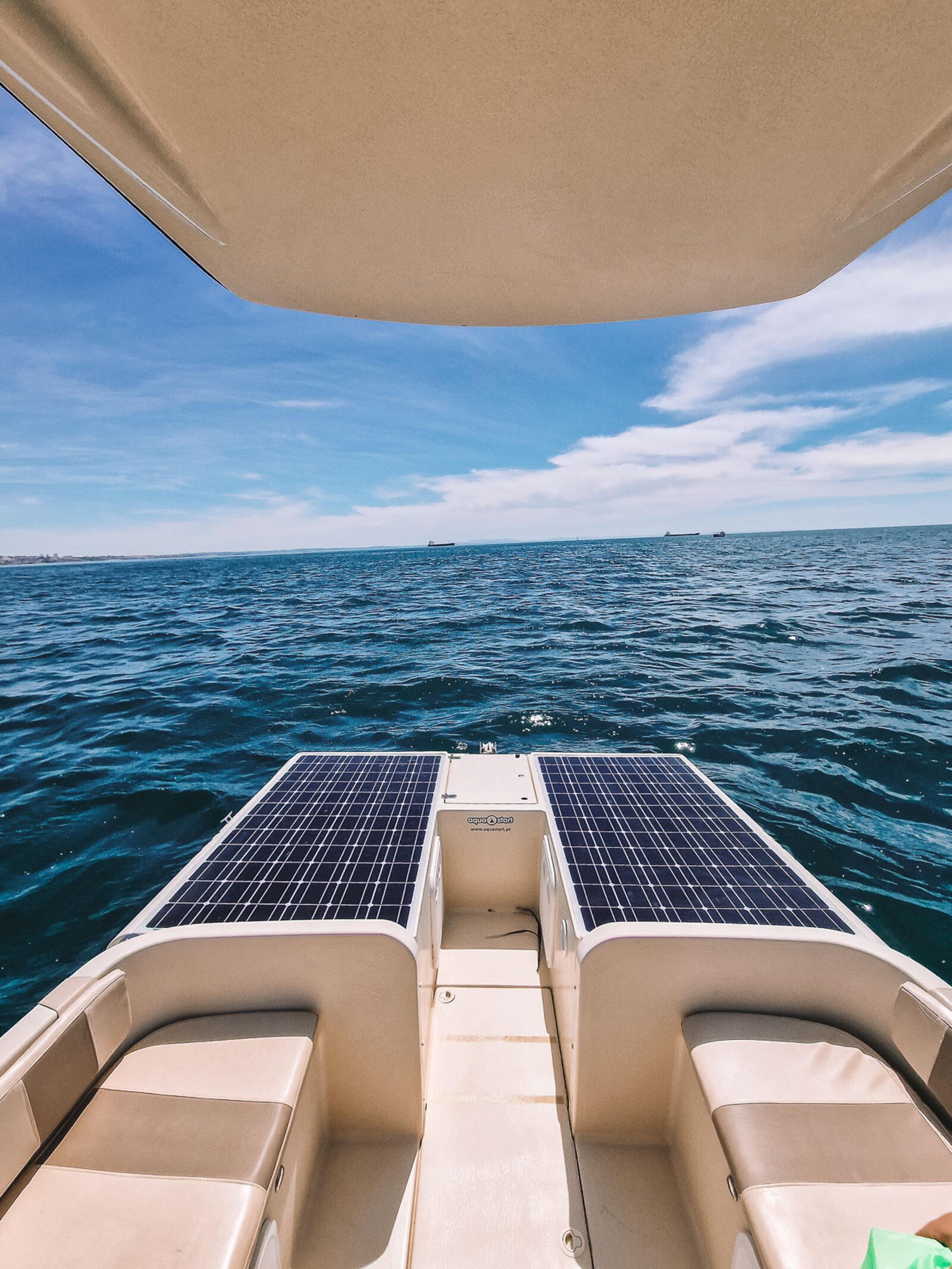 solar panels on a solar powered boat in the ocean
