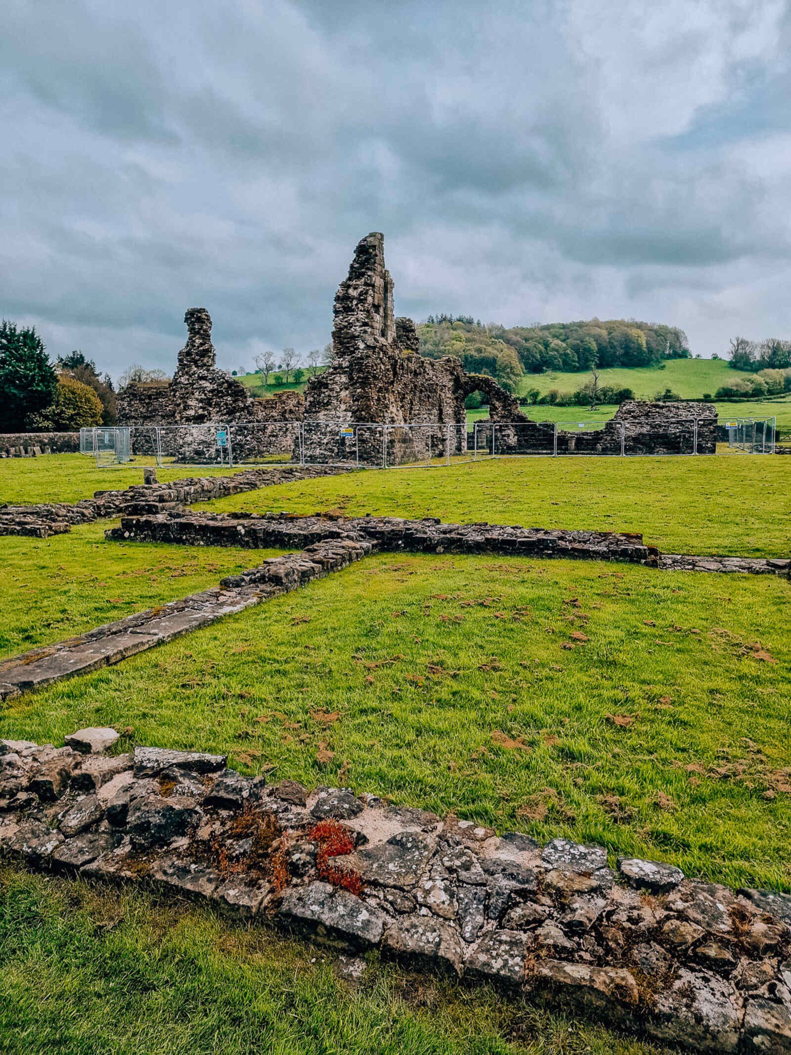 the ruins of an old foundation showing the shape of a historic abbey - Sawley Abbey