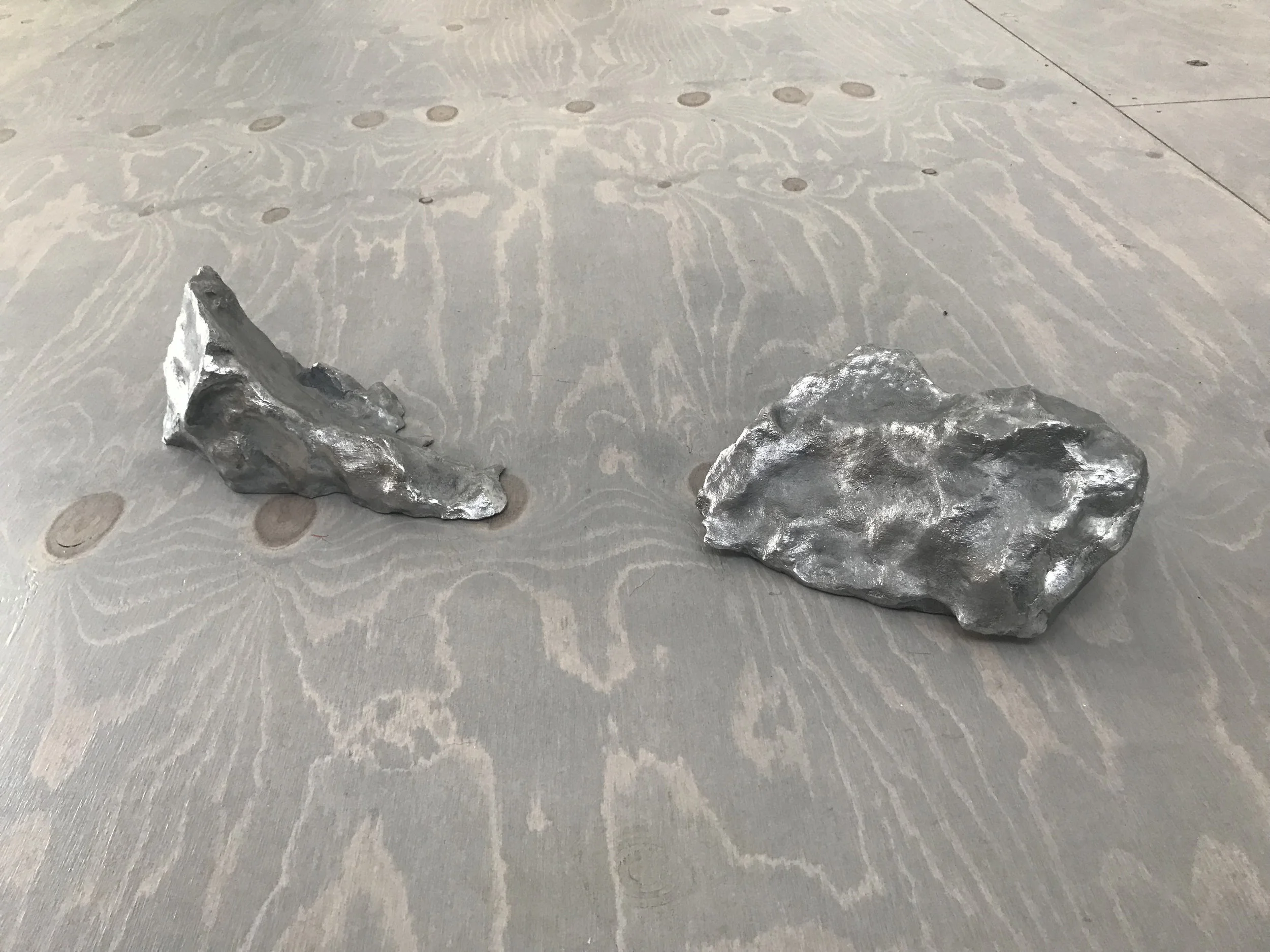 Joseph Smolinski, Lost Monuments, 2018. 3D scanned melted snow piles cast in aluminum.