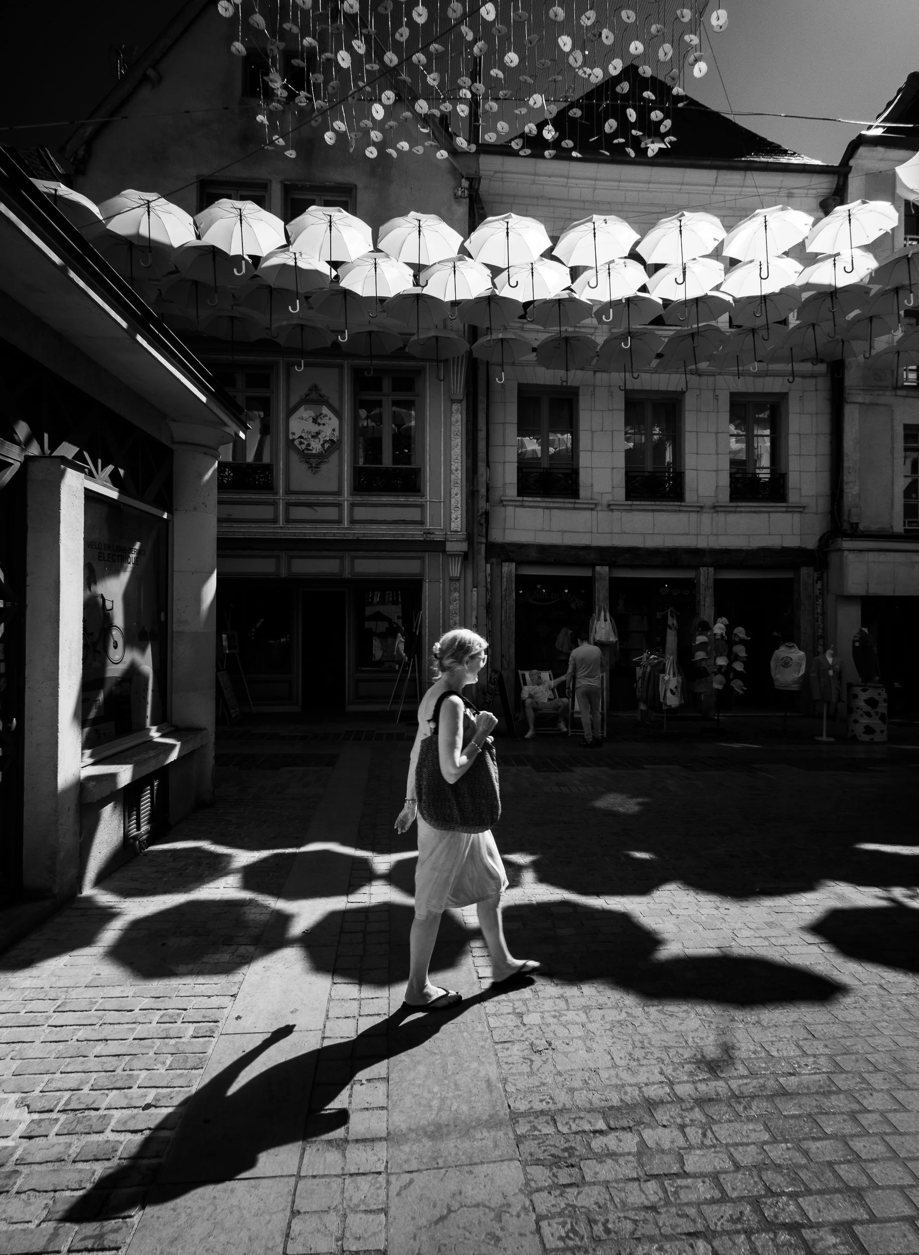 French street with artistic umbrellas
