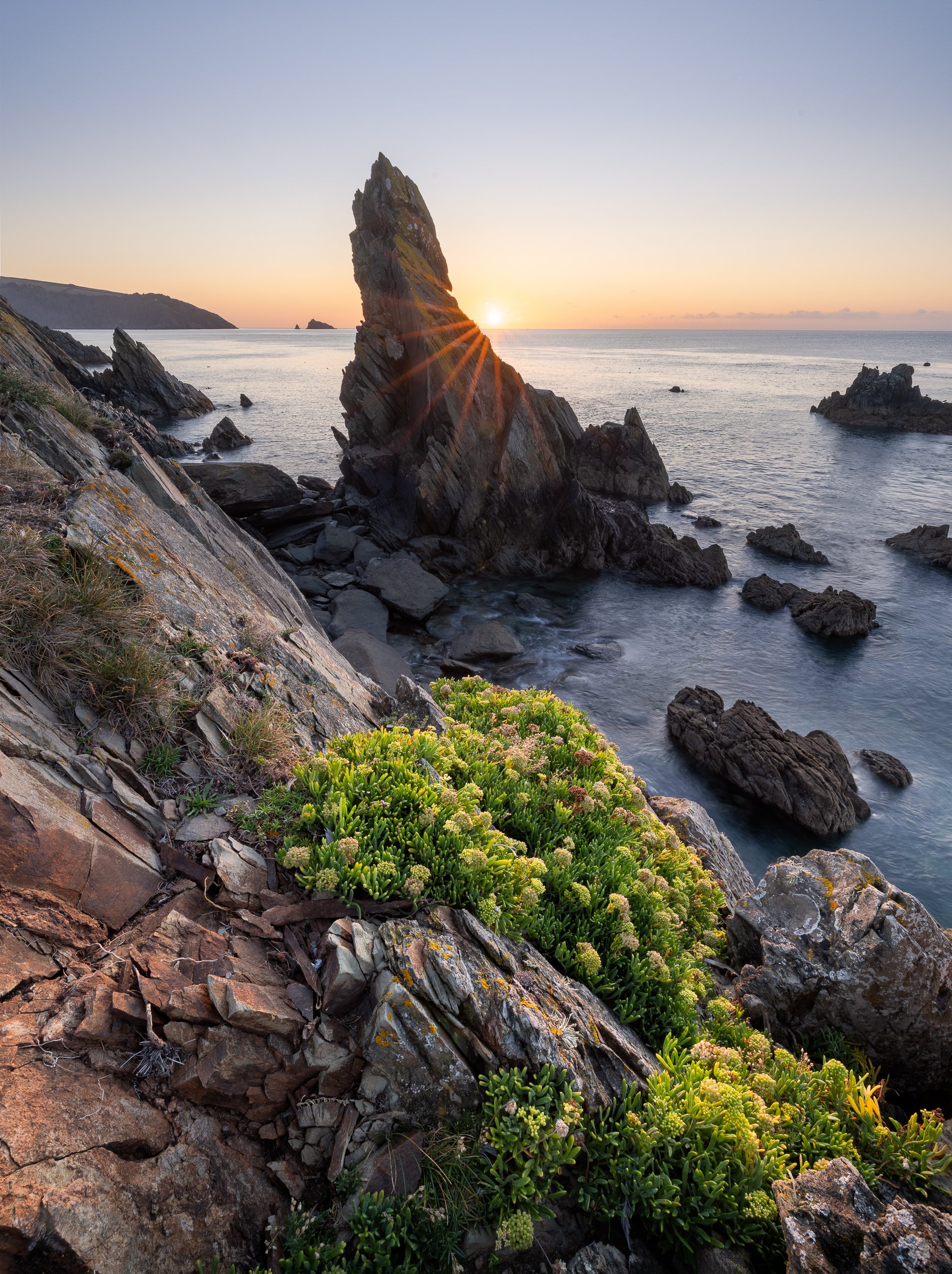 Sunstar on sea stack in South Devon