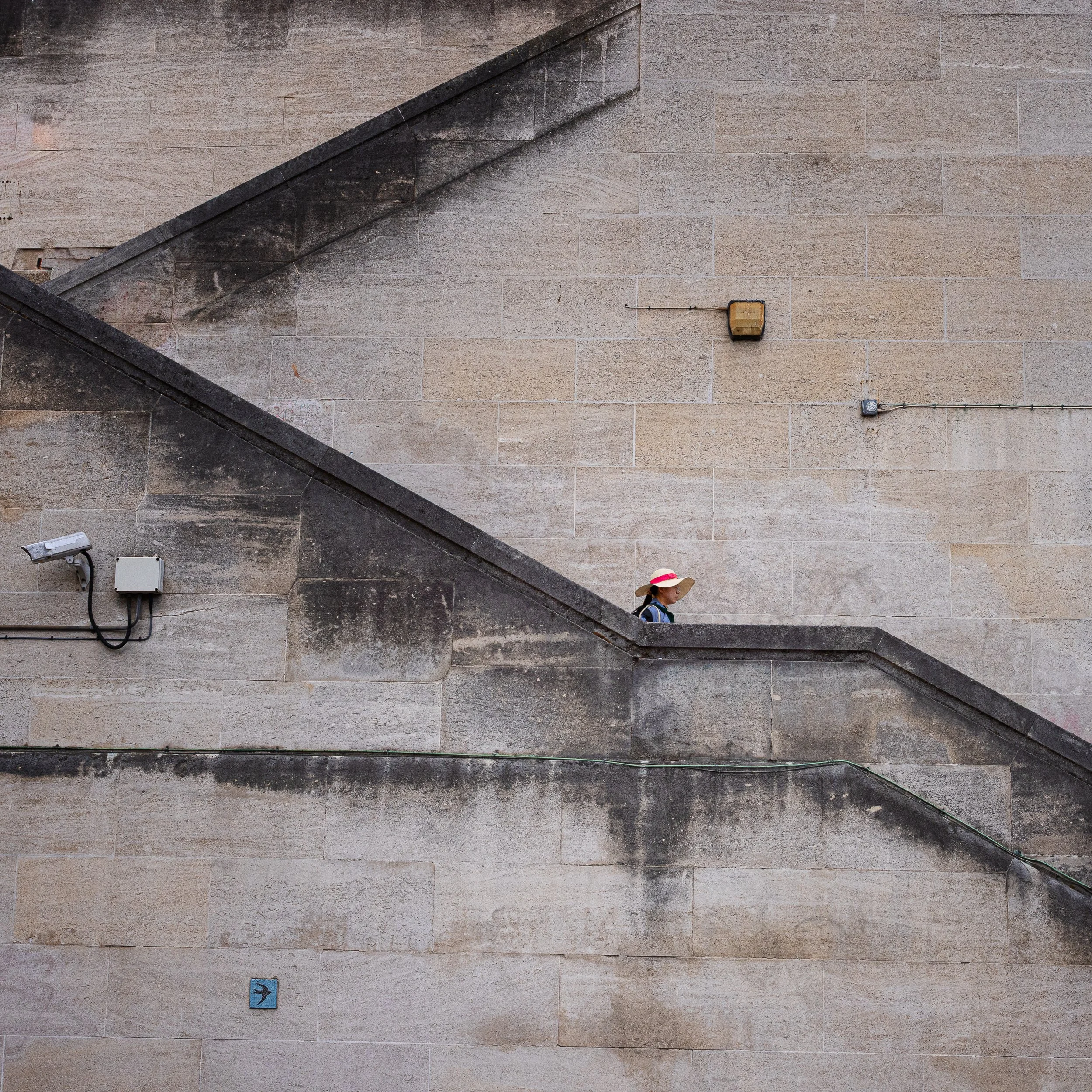 Person against London architecture