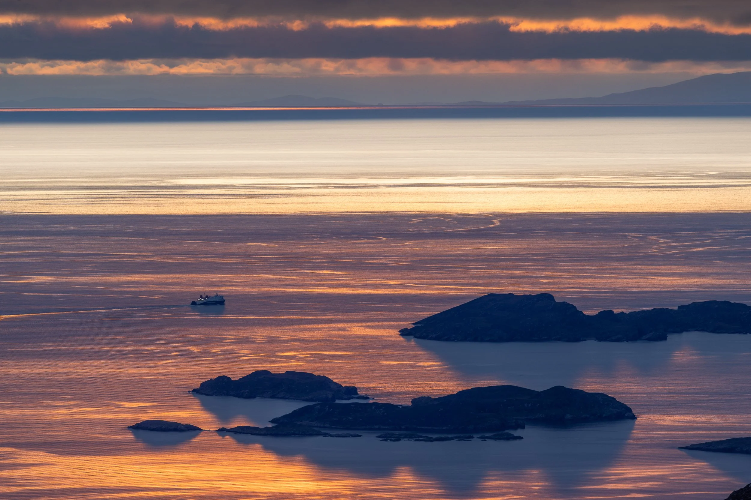 The Summer Isles, Scotland with a ferry passing