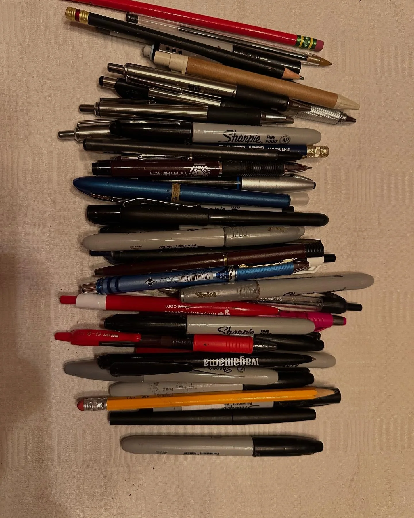 Cleaned out my car of 10 years and found these among the rummage. Explain to me why I could NEVER find anything to write with. 6 #pencils, 22 #pens, 16 #markers.