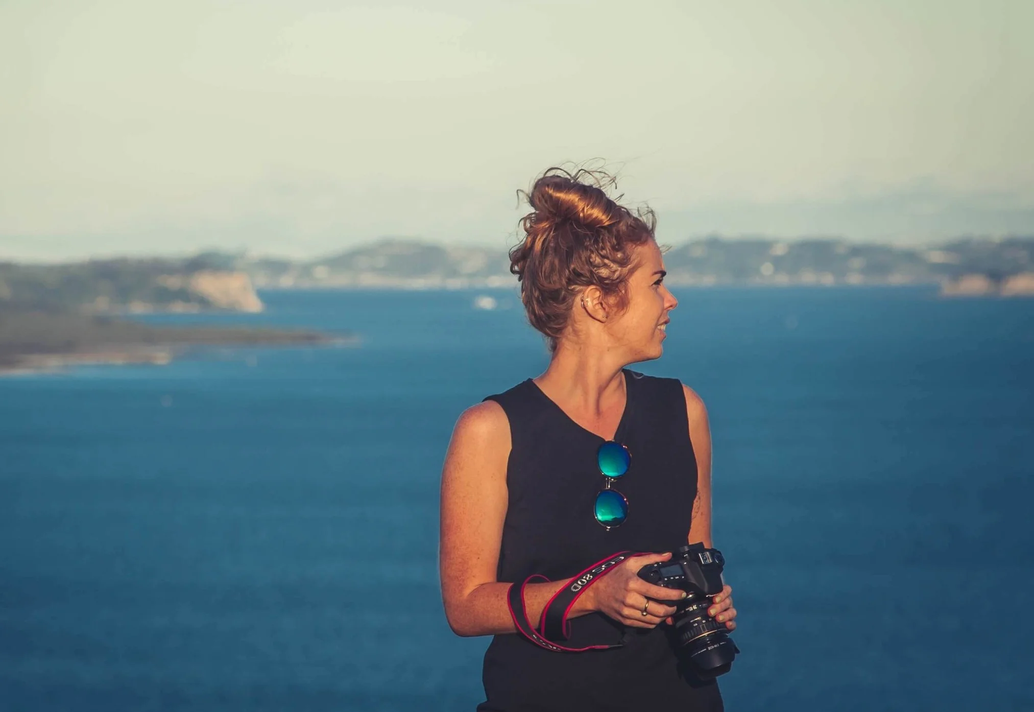 Woman-with-camera-jesse-parkinson-193638-unsplash.jpg