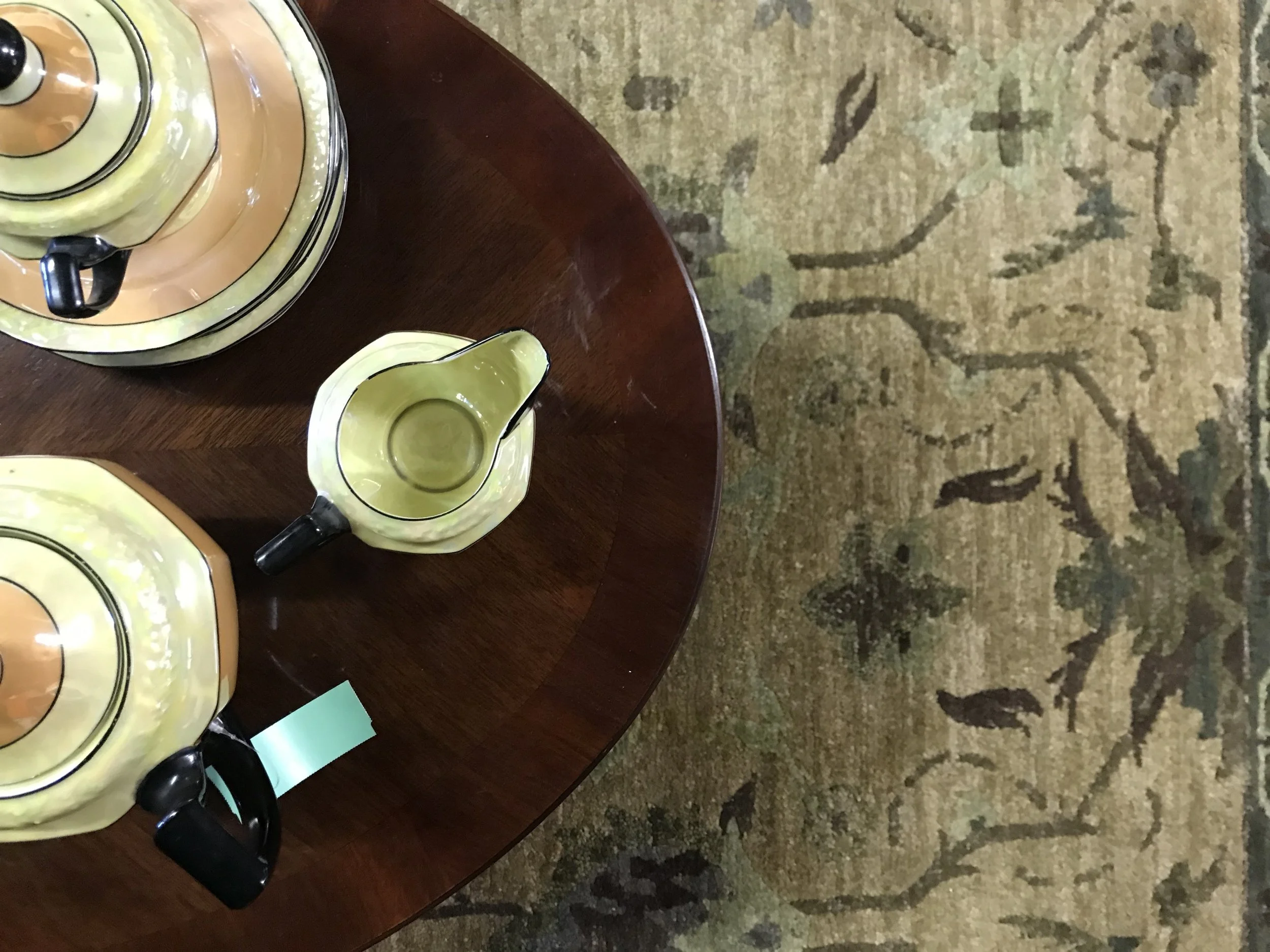Hand knotted Nepali rug, vintage tea set and beautiful coffee table all for sale.