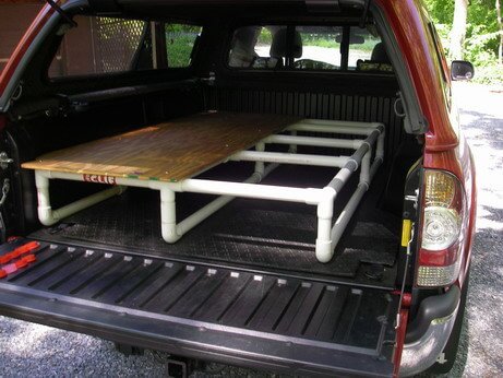 pickup truck with pvc built sleeping platform plywood on top