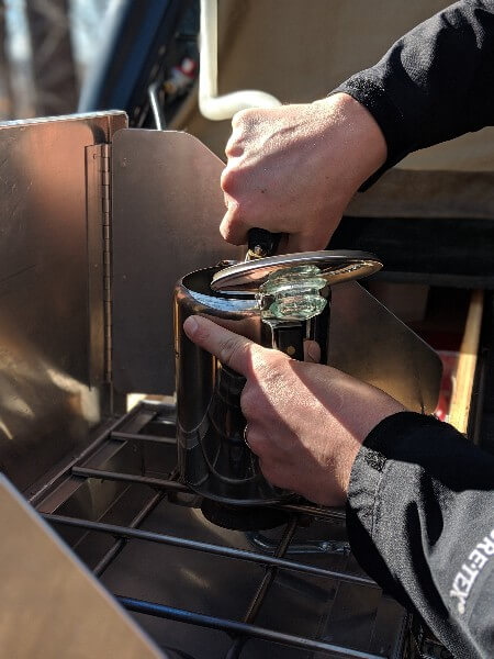 add cold water to camping coffee pot for cowboy coffee