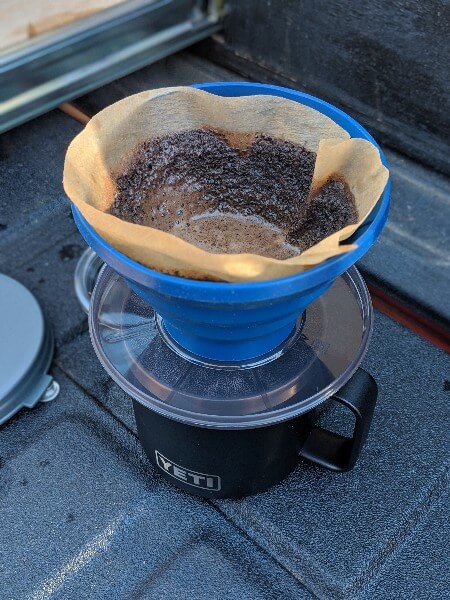 wet coffee grounds in gsi javadrip pour over camping coffee