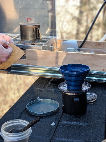 gsi javadrip on truck tailgate to make camping coffee