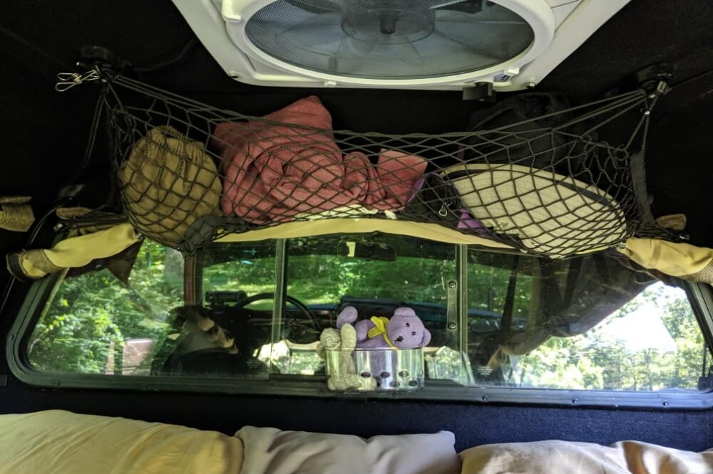 Cargo net for bulky things that we need easy access to; suction cup caddy on window