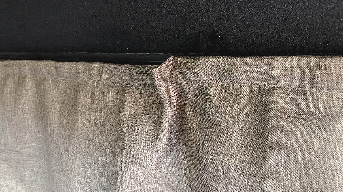 Here's a comparision of when the velcro is attached 1/2 inch down (on the right), and when it is attached right along the top of the curtain (on the left).