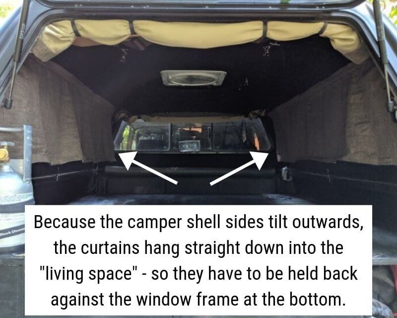 Figuring out how to hold curtains back against a truck shell camper.