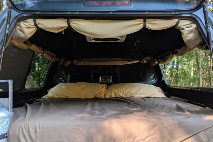 Tutorial on building DIY camper shell curtains that roll up.