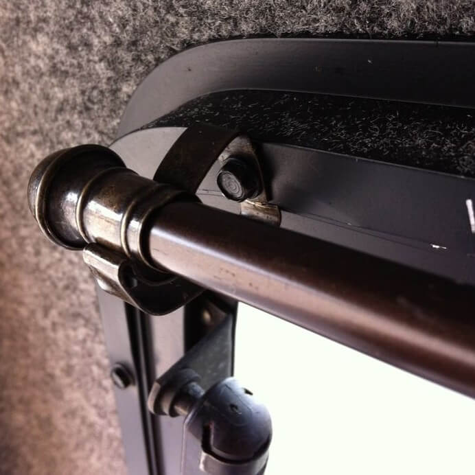 Use the screws to mount an L shaped mounting bracket with a rod, like azukibean shows in his instructable on camper curtains.