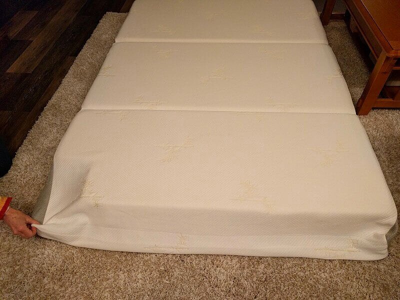 trifold foam mattress cut and recovered
