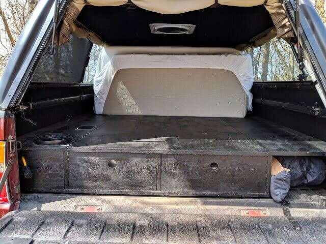 milliard tri fold suv mattress or truck bed mattress completely folded away on sleeping platform