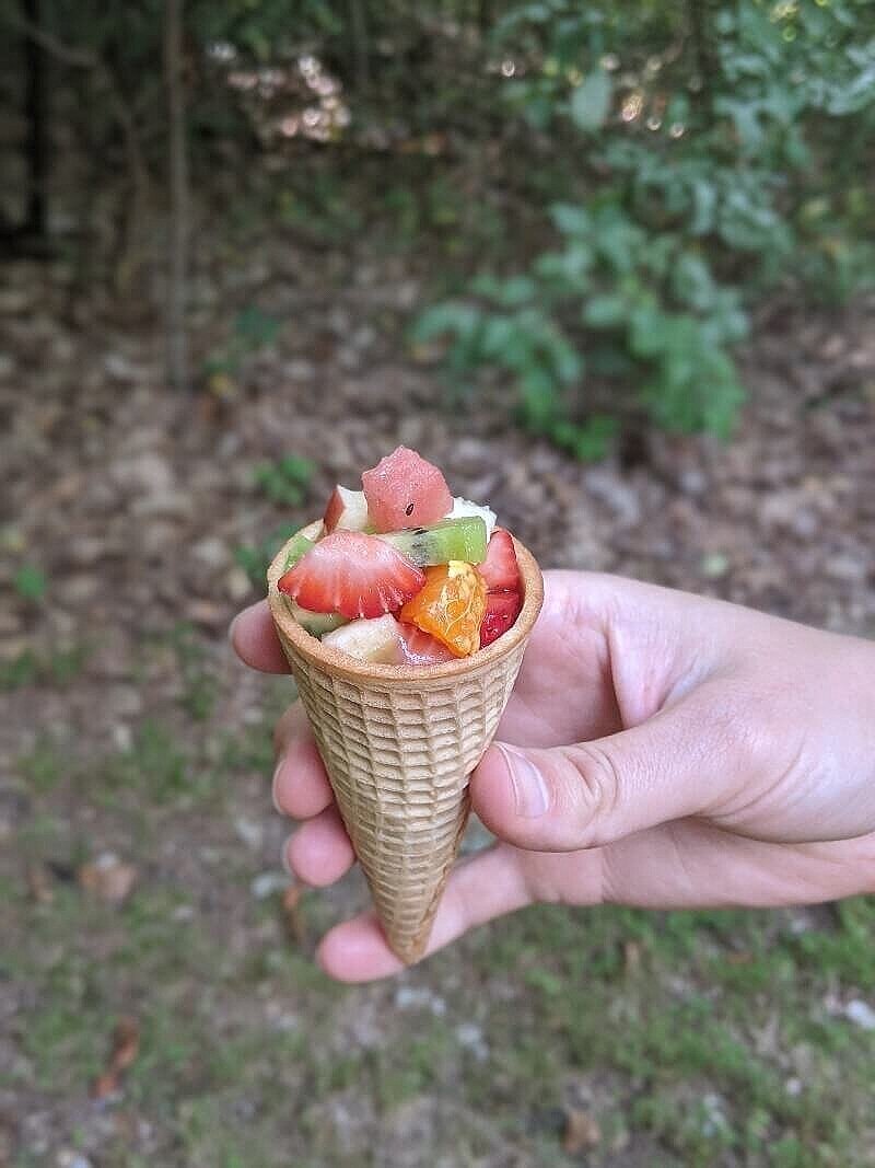 Fruit cones as a camping snack for kids.