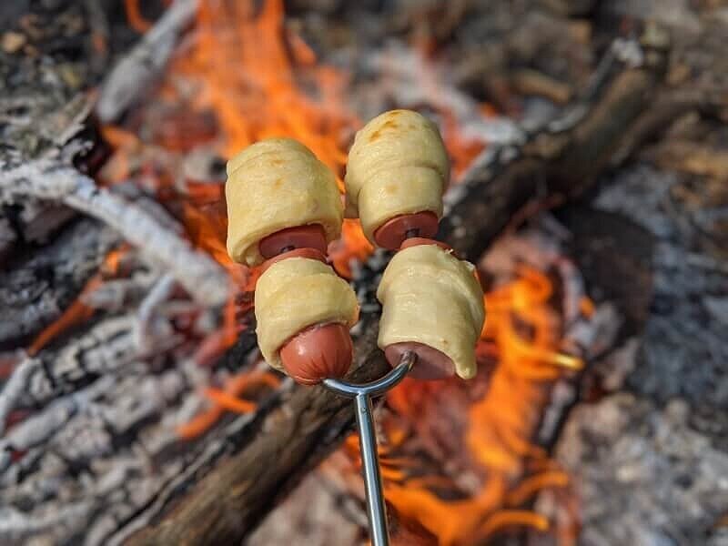 Mini pigs in a blanket for kids while camping.
