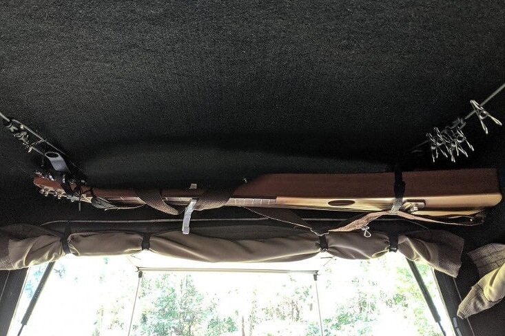 Backpacking guitar hung from Cargo Rack mounts using Velcro bundling straps