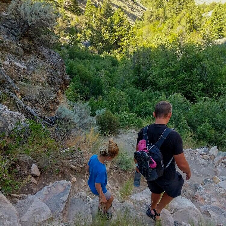 family hiking goldbug hot springs trail in idaho