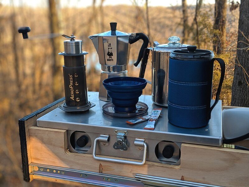 truck camping gear for making coffee on a camp stove