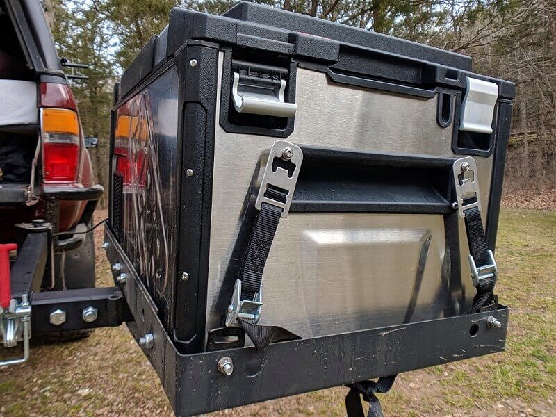 12v camping fridge mounted to a pickup truck camper for truck bed camping and overlanding