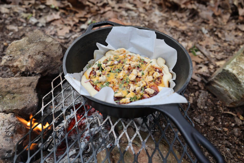 how to bake dutch oven camping pizza