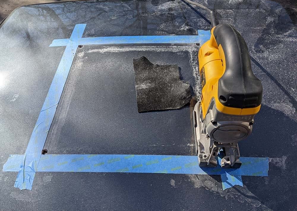 cutting opening for vent fan installation into the truck topper camper shell