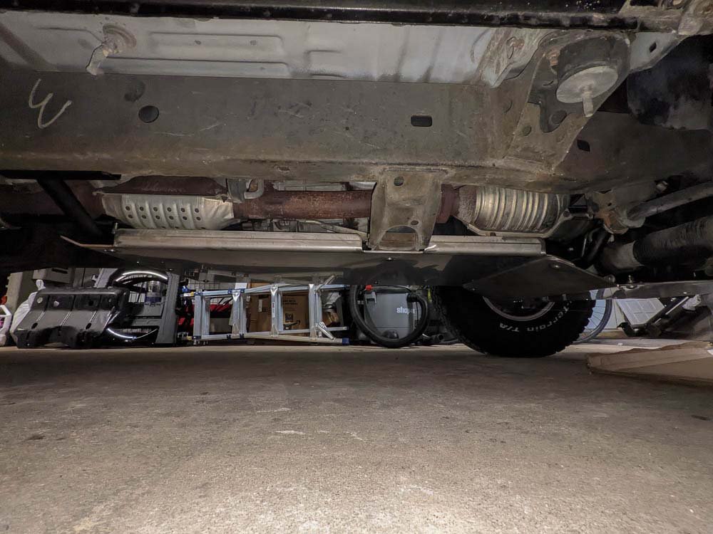 skid plates installed on first gen Toyota Tacoma overland truck build