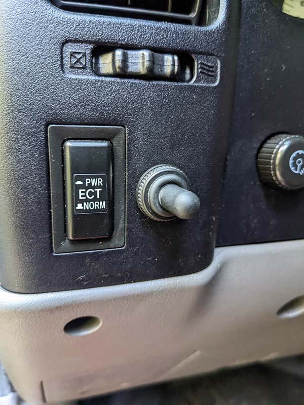 off road light switch for Baja Designs LP9 Pros installed in Toyota Tacoma overland truck build