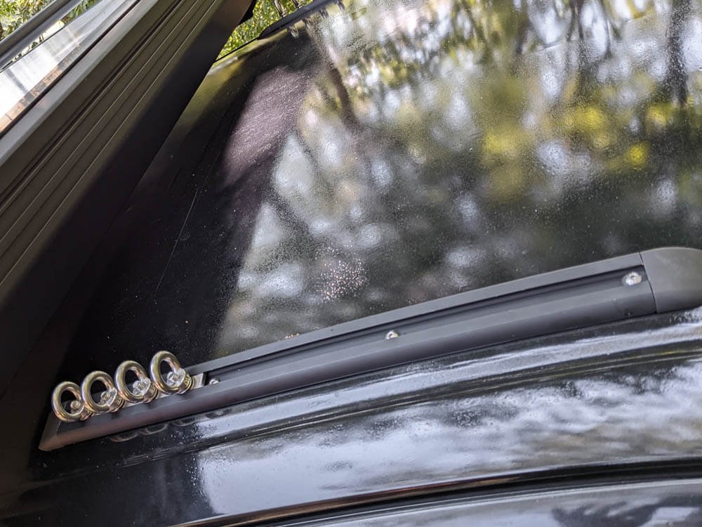 t-track installed on the toyota tacoma's roof with M8 roof rack mounting studs