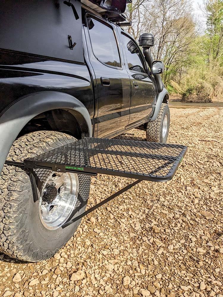 completed setup of the tire table overland camping table on our truck camper tire