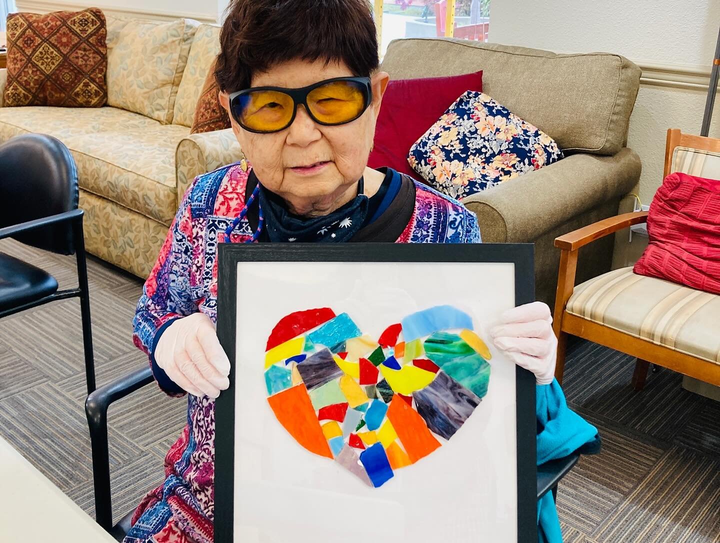 Art Bias Artist Amber Smith shared her expertise and love of glass mosaics with the senior residents of HIP Housing over the last two weeks. Seniors traced a chosen image, used glass cutters to break the glass into pieces, then arranged &amp; glued t